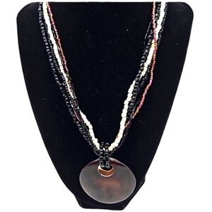 Costume jewelry beaded necklace with pendant